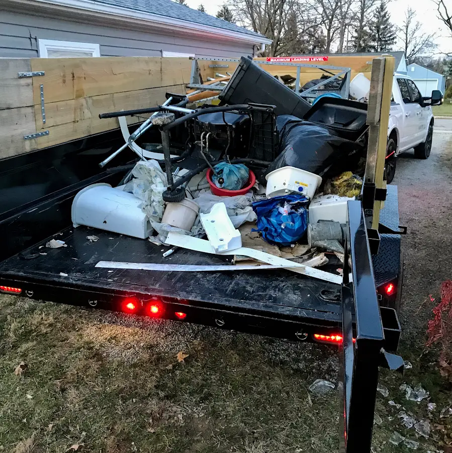Roll-off dumpster delivered to a residential driveway in Laurel